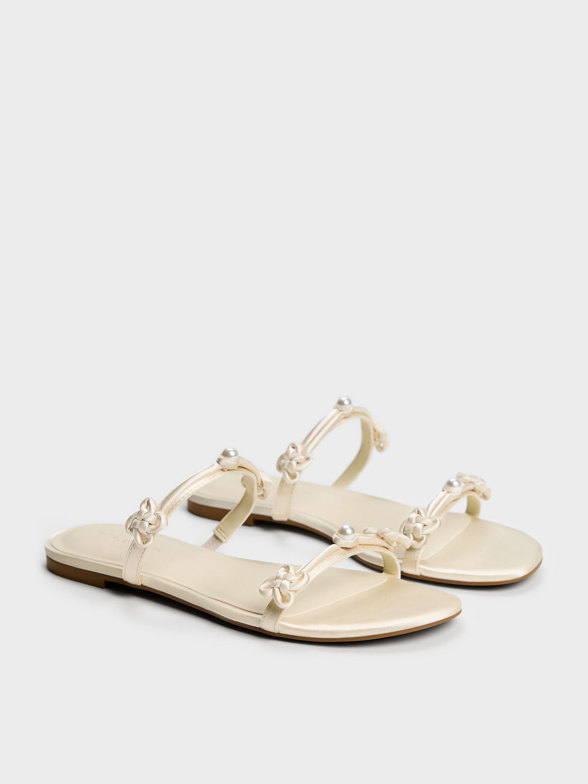 Orinda Knot-Pearl Slide Sandals - Butter | CHARLES & KEITH