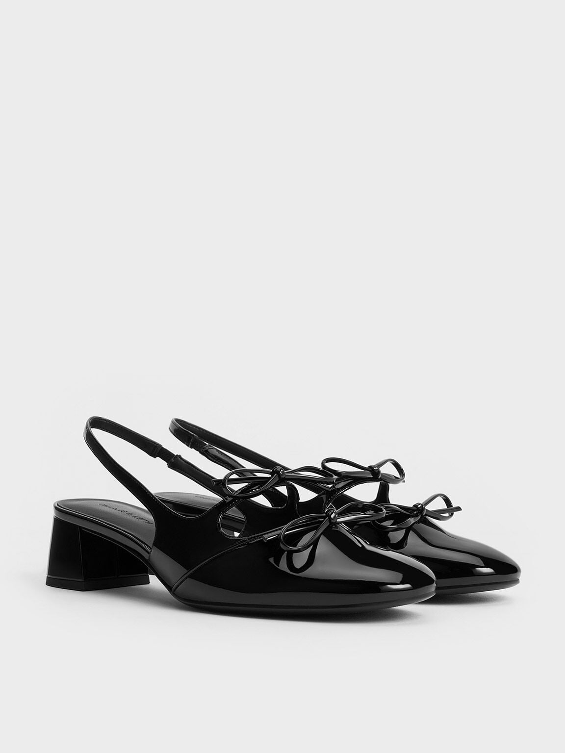 Dorri Double-Bow Slingback Pumps - Black Patent | CHARLES & KEITH