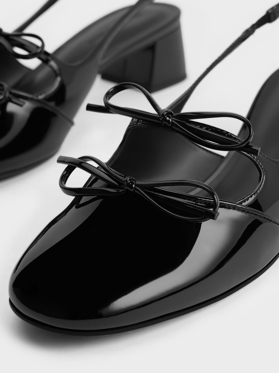 Dorri Double-Bow Slingback Pumps - Black Patent | CHARLES & KEITH
