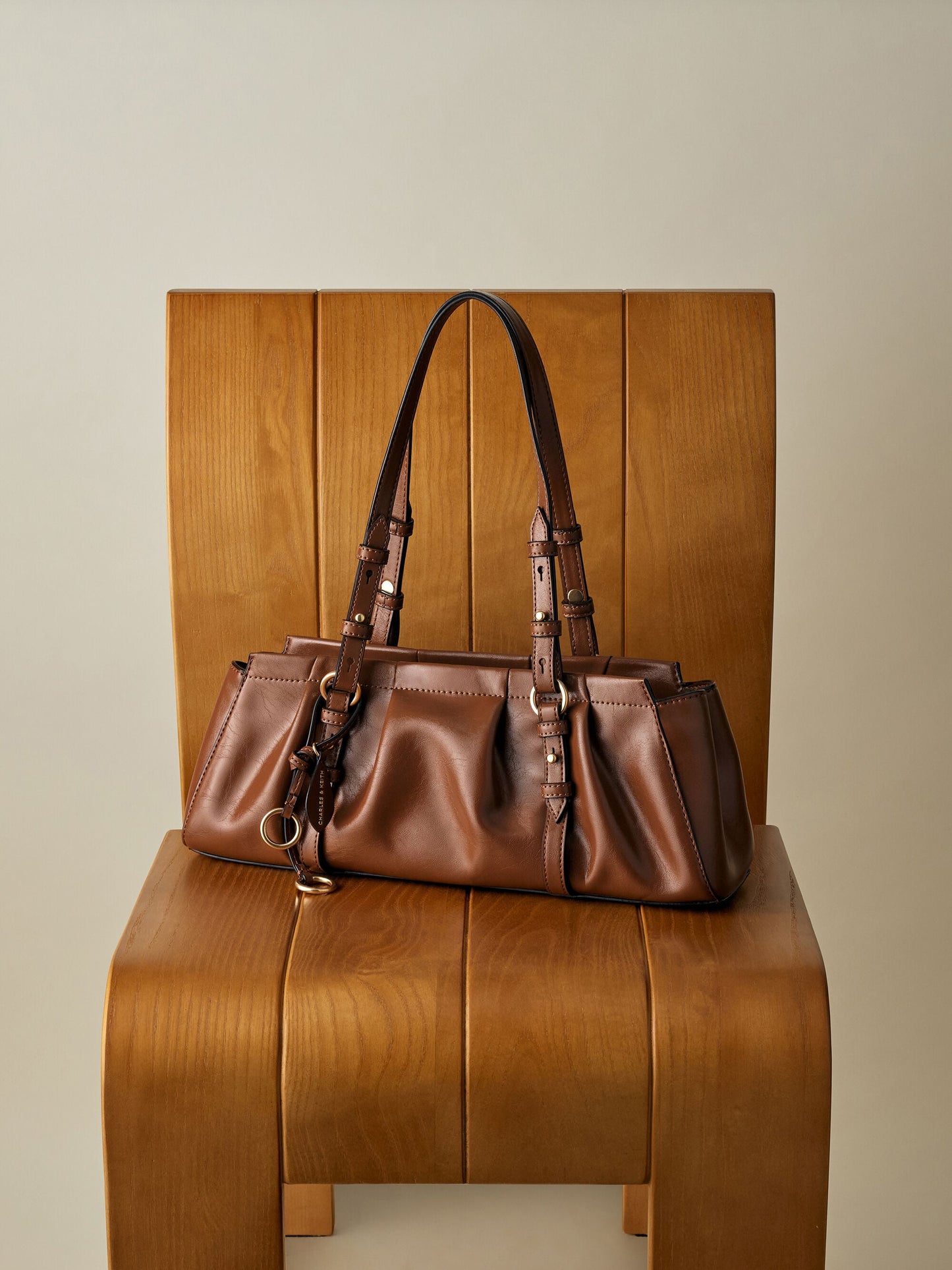 Britton Elongated Shoulder Bag - Chocolate | CHARLES & KEITH