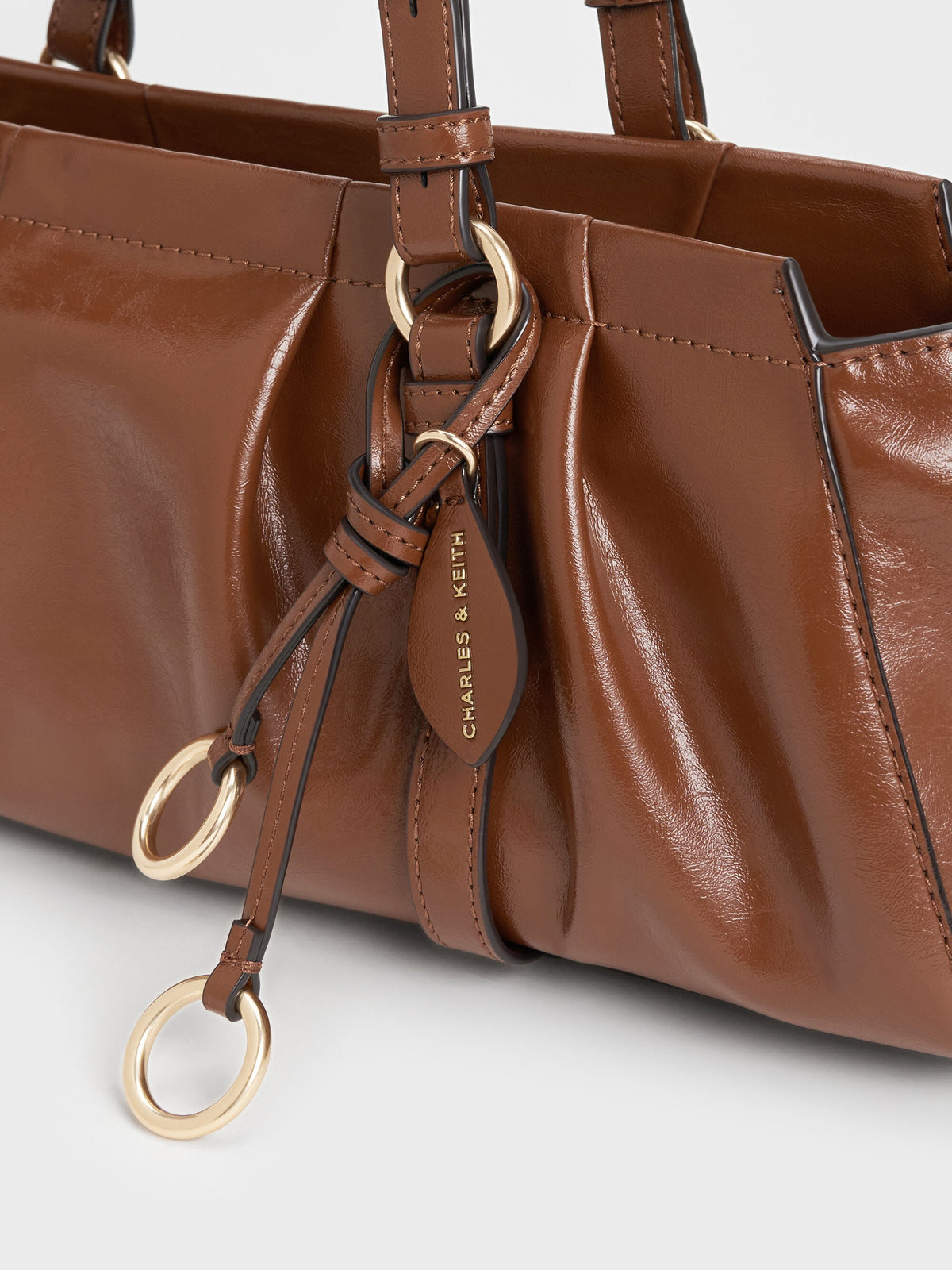 Britton Elongated Shoulder Bag - Chocolate | CHARLES & KEITH
