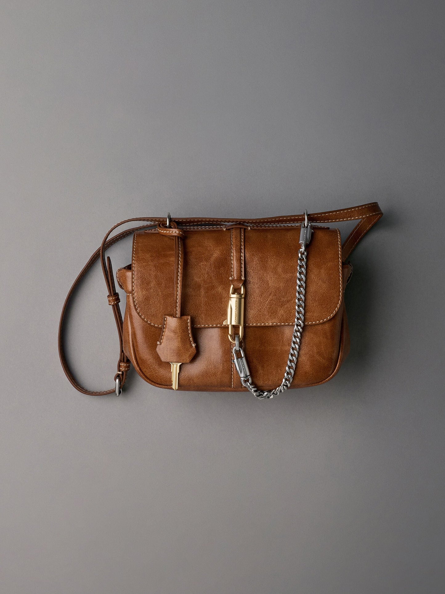 Delfina Chain Crossbody Bag - Distressed Tan | CHARLES & KEITH