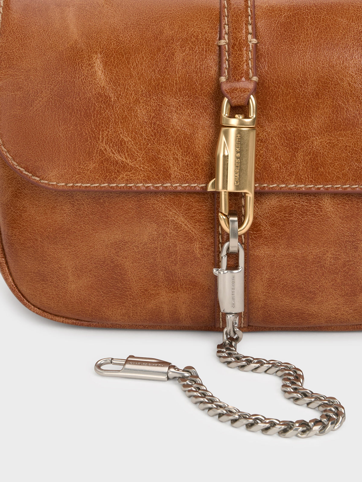 Delfina Chain Crossbody Bag - Distressed Tan | CHARLES & KEITH