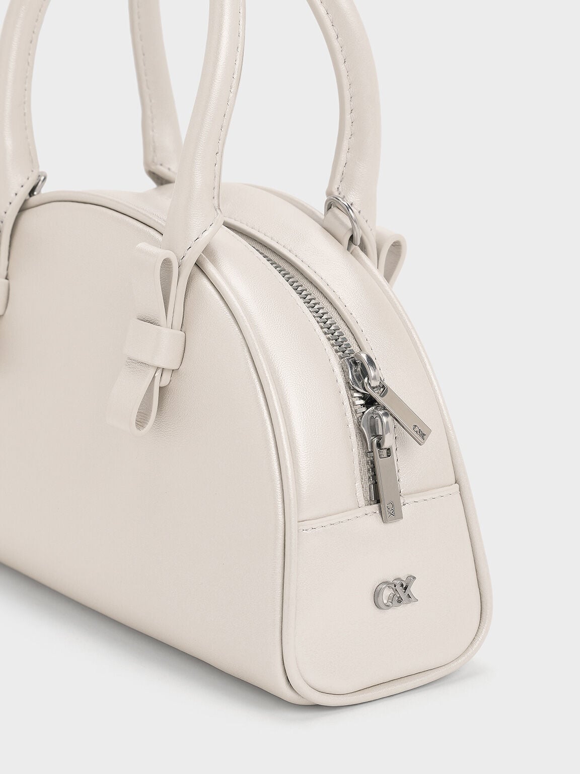 Leather Half-Moon Bowling Bag - White | CHARLES & KEITH