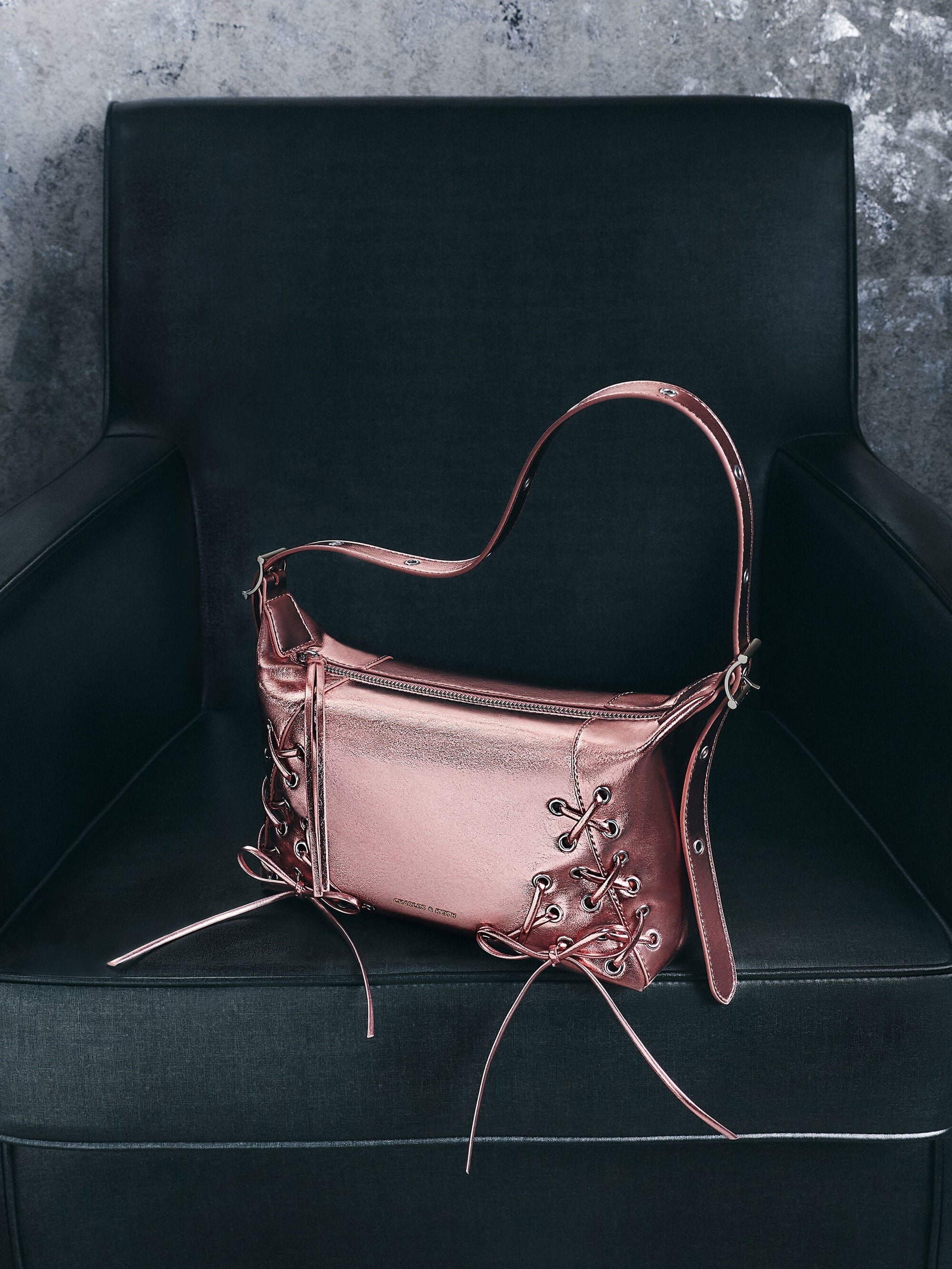 Xylia Metallic Grommet Lace-Up Shoulder Bag - Aura Pink | CHARLES & KEITH